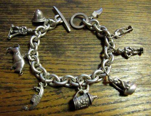 Sterling Silver Charm Bracelet with 9 charms depicting a European Trip