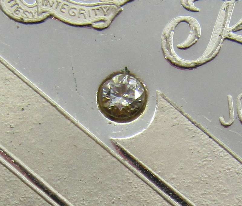 Sterling Silver Proof medallion with diamond