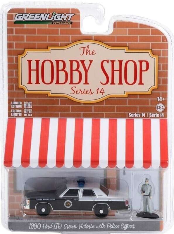 Greenlight  1:64 The Hobby Shop Series 14 1990 Ford LTD Crown Victoria W/ Police Officer