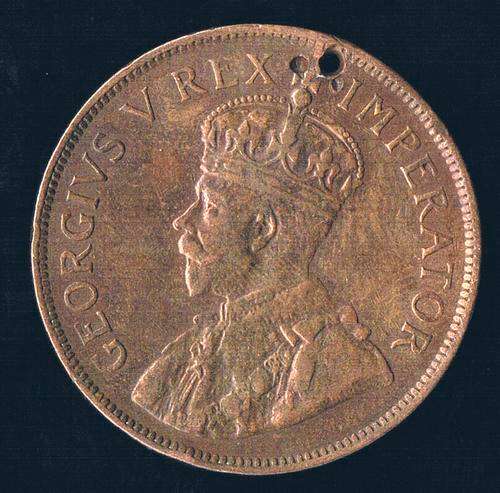 1929 1D PENNY. ZUID AFRICA. HOLED