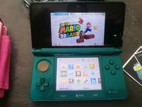 Nintendo 3DS with accessories and 29 games