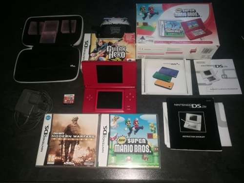Red Nintendo DS Lite and 4 Games