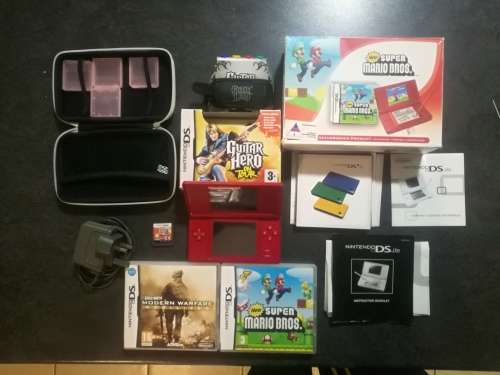 Red Nintendo DS Lite and 4 Games