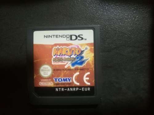 Red Nintendo DS Lite and 4 Games