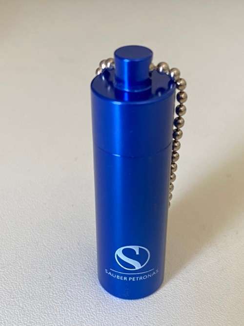 Official Sauber Petronas Formula 1 Team Earplugs and Metal Case [unused]