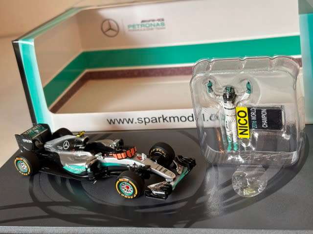 Nico Rosberg - 2016 Mercedes F1 `World Champion with figurine` (Rare Spark larger box 1:43)