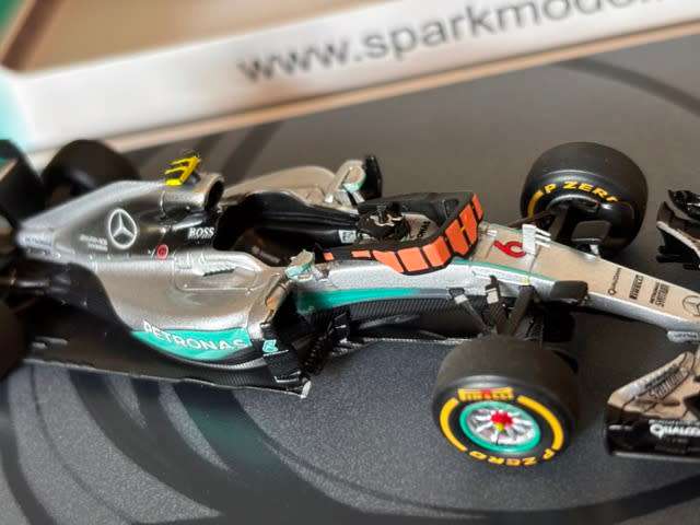 Nico Rosberg - 2016 Mercedes F1 `World Champion with figurine` (Rare Spark larger box 1:43)