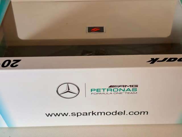 Nico Rosberg - 2016 Mercedes F1 `World Champion with figurine` (Rare Spark larger box 1:43)