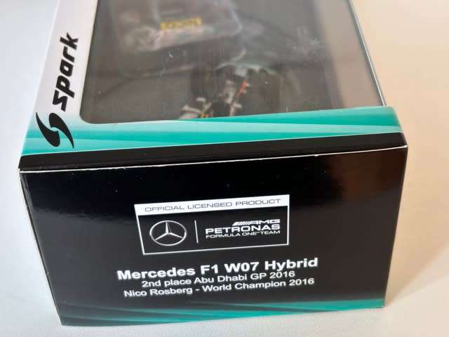 Nico Rosberg - 2016 Mercedes F1 `World Champion with figurine` (Rare Spark larger box 1:43)