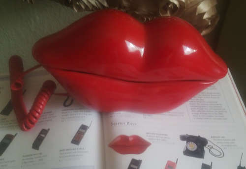 RED LIPS TELEPHONE (HIGHLY COLLECTIBLE AND HARD TO FIND))
