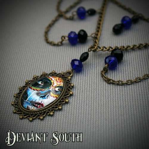Deviant South Sugar Skull Cabochon 18x25mm Bronze Necklace with Facetted Blue Beads