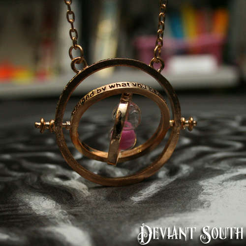 Harry Potter Time Turner Hermione Rotating Gold-tone Hourglass Necklace - Pink Sand