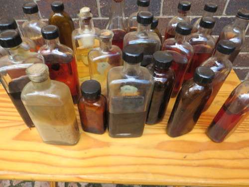 23 OLD MEDICINE BOTTLES WITH UNKNOWN CONTENT - AS PER SCAN
