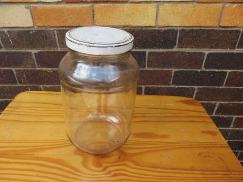 LARGE GLASS STORAGE JAR - 145 MM DIAM. - 235 MM HIGH - AS PER SCAN