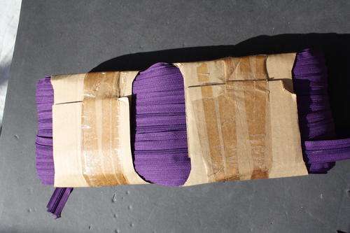 A ROLL OF 200.00 M YKK ZIPS - 3 CF CHAIN P12 DYED - COLOUR 865