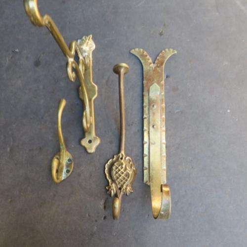 4 VARIOUS BRASS COAT HANGERS - PLEASE HAVE A LOOK