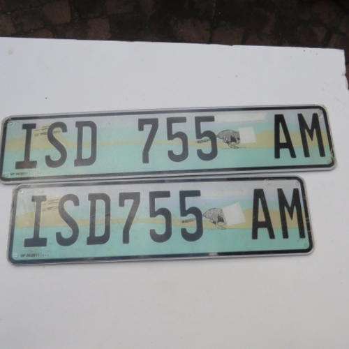 SET OF PLASTIC NUMBER PLATES - ISD 755 AM - PLEASE HAVE A LOOK