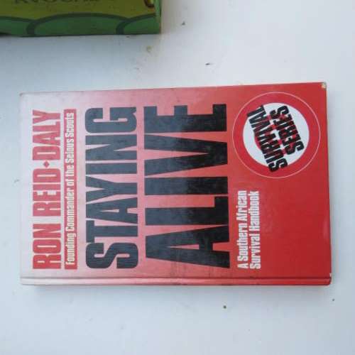 STAYING ALIVE - A SOUTH AFRICAN SURVIVAL HANDBOOK - RON REID - DALY - FIRST EDITION 1990