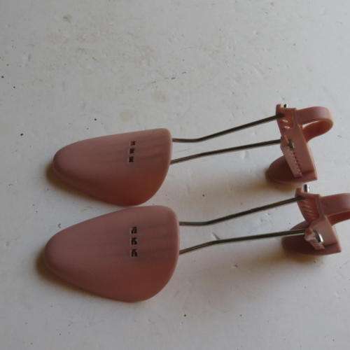 A PAIR OF PLASTIC SHOE STRETCHERS - FRANCE