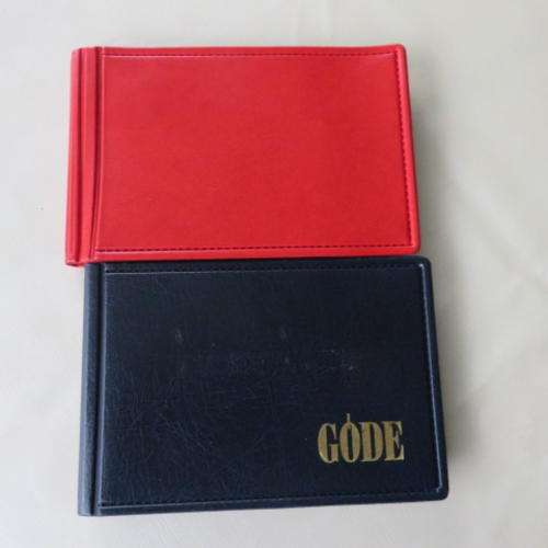 TWO SMAAL COIN ALBUMS WITH MARKED POUCHES