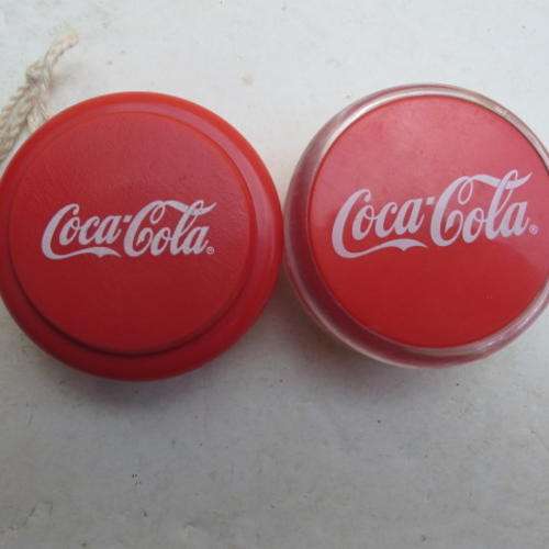 TWO COCA COLA - TOTAL YO - YO'S - DIFFERENT SIZES OF WRITINGS AT THE FRONT AND BACK