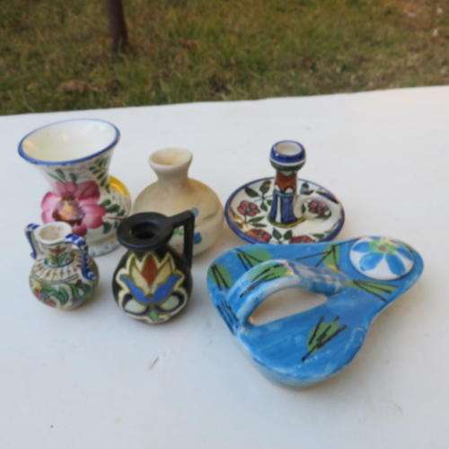 FOUR  VARIOUS SMALL CERAMIC VASES ONE CANDLE HOLDER  AND ONE OIL LAMP