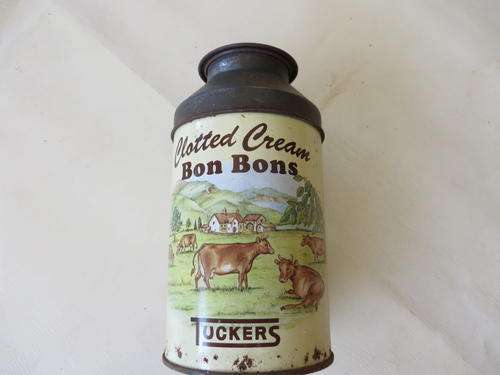 TIN BOX - 65 MM DIAM. - 120 MM HIGH - TUCKER'S CLOTTED CREAM BONBONS - CAN'T OPEN THE LID