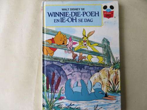 WALT DISNEY - WINNIE - DIE - POEH EN IE-OH SE DAG -  GOOD CONDITION, SOME WEAR AND TEAR ON COVER