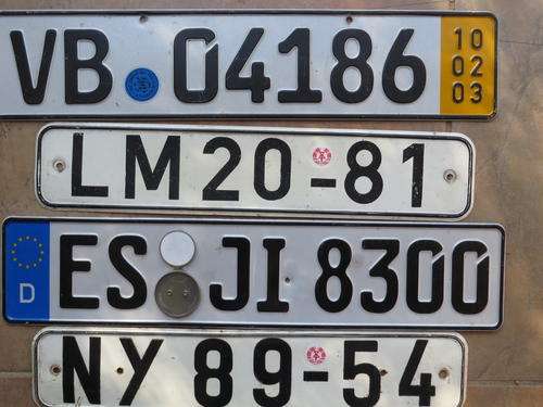 EAST MEETS WEST - TWO EAST GERMAN AND TWO WEST GERMAN NUMBER PLATES - ONE LOT