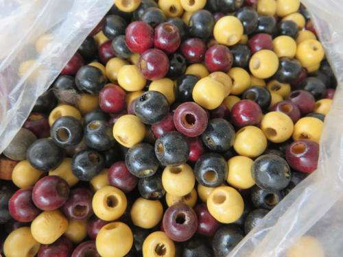300 GRAMS OF WOODEN BEADS - APPR. 7 MM DIAM. - AS PER SCAN