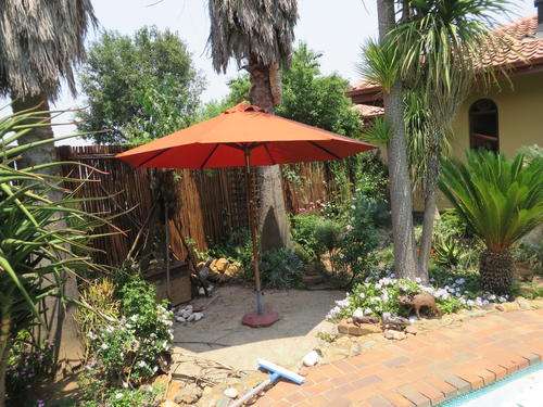 3.30 M ROUND TILT UMBRELLA - TERRACOTTA WITH HEAVY BASE - AS PER SCAN - CAN ONLY BE COLLECTED