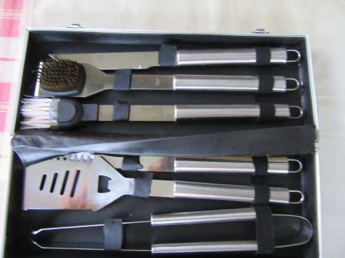 SIX PIECE STAINLESS STEEL BRAAI SET IN ALUMINIUM BOX - TAU PRIDE - AS PER SCAN