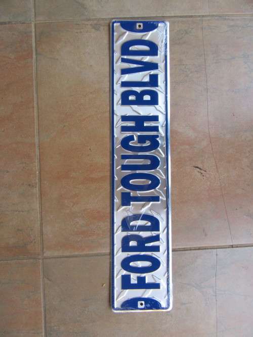 TIN SIGN - FORD TOUGH BLVD - 610 X 125 MM - AS PER SCAB