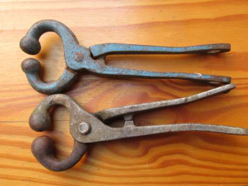 FIRST BID WINS!!! - TWO VINTAGE NOSE PLIERS - FOR COWS AND BULL - AS PER SCAN
