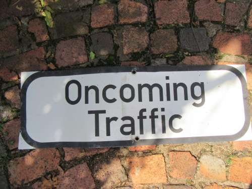 FOR THE MANCAVE - BENDED / DENTED ROAD SIGN - ONCOMING TRAFFIC - 900 X 300 MM - AS PER SCAN