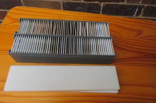 TWO SLIDE CABINS WITH 100 UNCHECKED SLIDES - AS PER SCAN