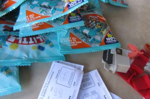 BUILD YOUR CHECKERS LITTLE SHOP - 25 SEALED PACKETS - 1 OPENED - AS PER SCAN