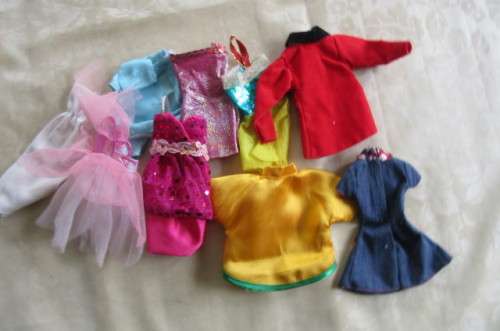 9 VARIOUS DOLLS DRESSES - ASER SCAN