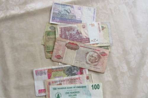 85 AGRO CHEQUES FROM ZIMBABWE and 16 OTHER AFRICAN NOTES -BID PER ITEM