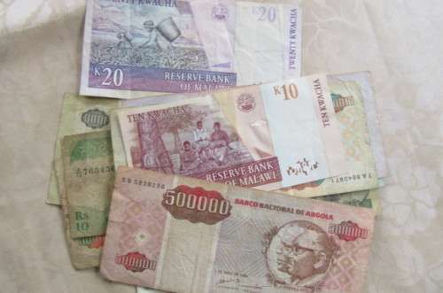 85 AGRO CHEQUES FROM ZIMBABWE and 16 OTHER AFRICAN NOTES -BID PER ITEM
