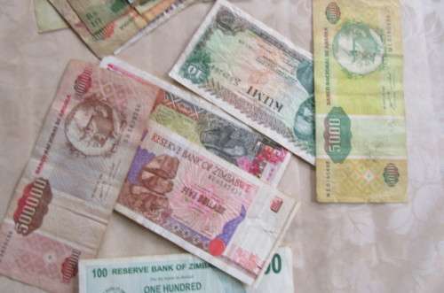 85 AGRO CHEQUES FROM ZIMBABWE and 16 OTHER AFRICAN NOTES -BID PER ITEM