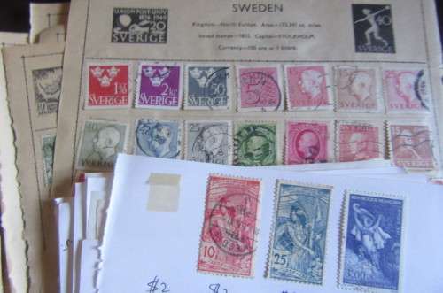 60 PAGES HINGED WITH WORLD STAMPS