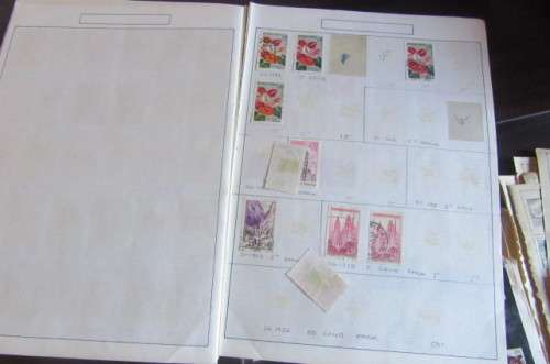 60 PAGES HINGED WITH WORLD STAMPS