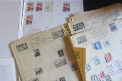 60 PAGES HINGED WITH WORLD STAMPS