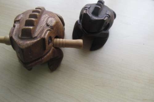 2 WOODEN NOISE MAKING FROGS ,SORRY ONE PIN ONLY - AS PER SCAN