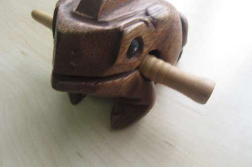 2 WOODEN NOISE MAKING FROGS ,SORRY ONE PIN ONLY - AS PER SCAN