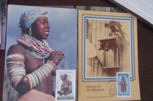 200 NEW POST CARDS WITH FOLDER -ONE LOT