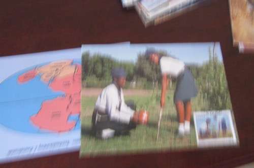 200 NEW POST CARDS WITH FOLDER -ONE LOT
