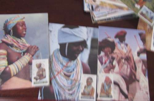 200 NEW POST CARDS WITH FOLDER -ONE LOT