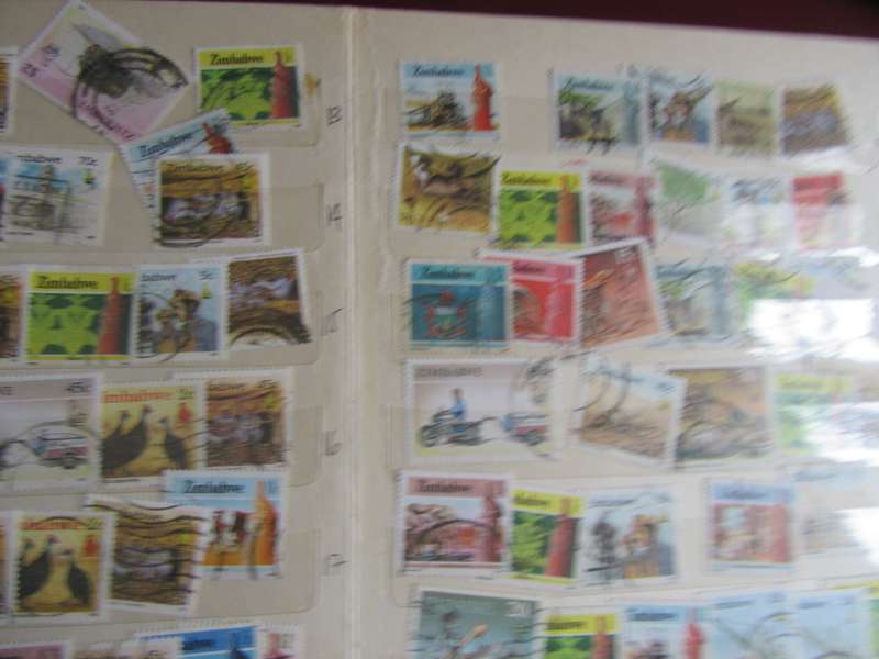 OVER 200 DUPLICATIONS FROM ZIMBABWE IN OLD STOCK BOOK - AS PER SCAN